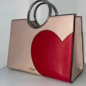 Pink Kate spade purse with heart design